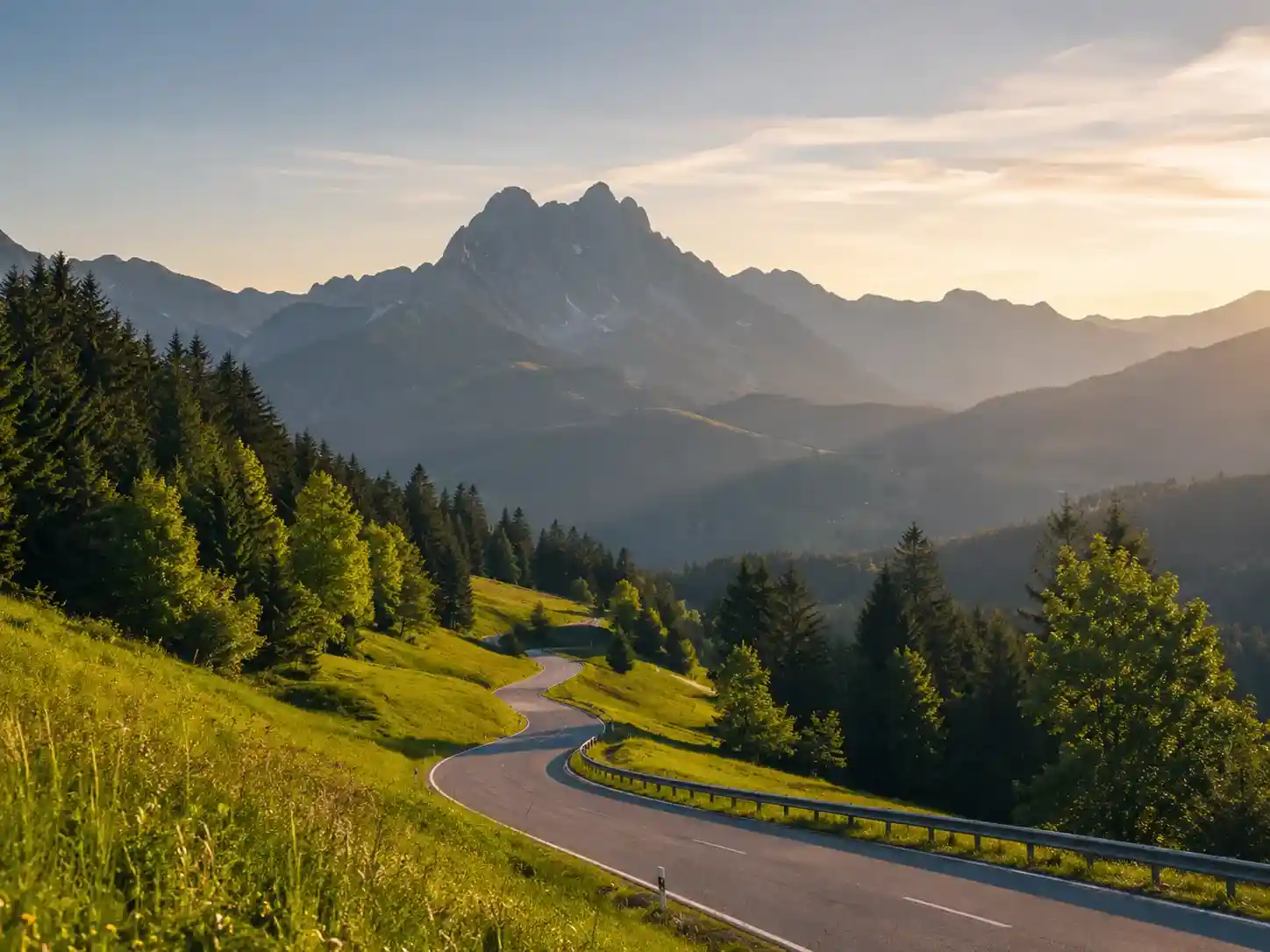 Winding Bavarian mountain route in golden light
